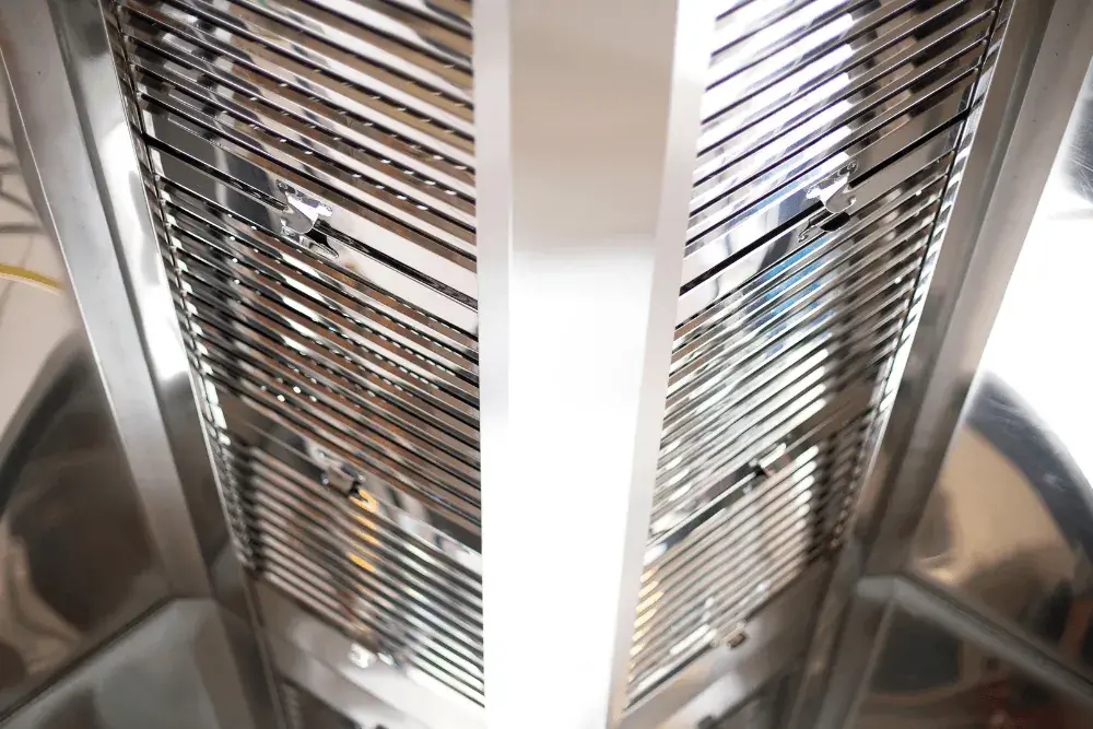 One Click Dubai technician servicing a commercial kitchen exhaust hood